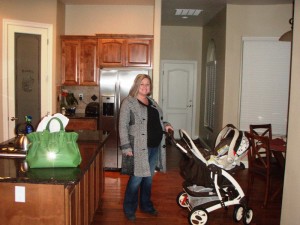 Kathy taking the just-assembled stroller for spin around the kitchen
